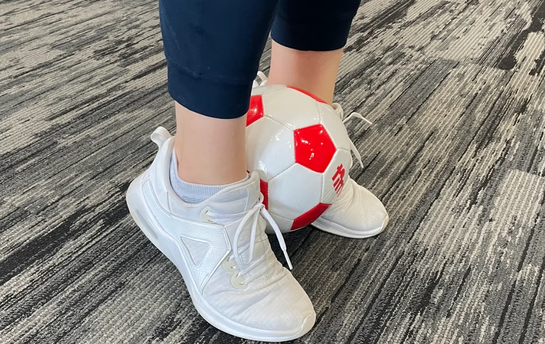 Soccer player in Burlington preparing for game highlighting sports injury prevention